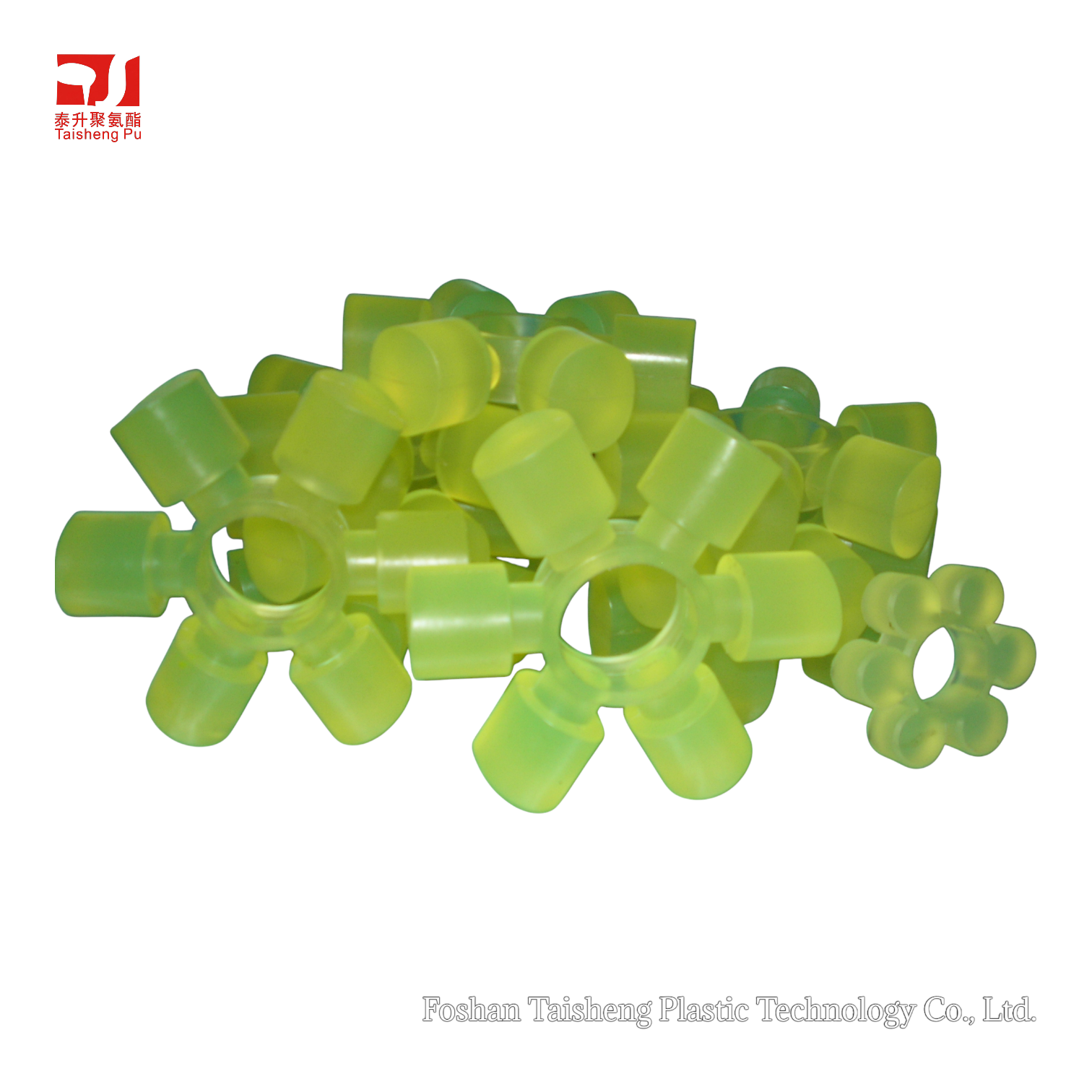 Star-shaped green polyurethane coupling spider for motor shafts.