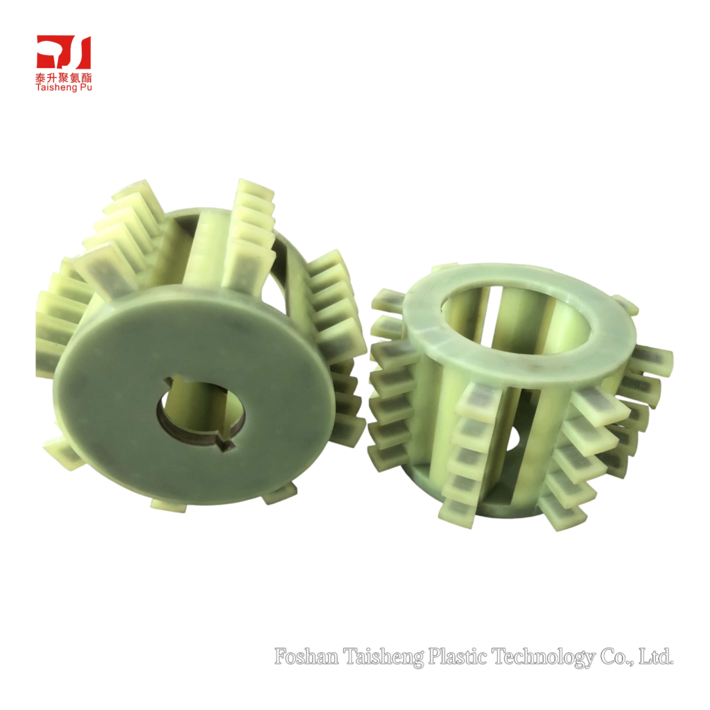 Two green polyurethane rotors with protruding square pegs around the circumference.